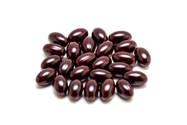 istock Chocolates in chocolate glaze isolated on white 1200975709