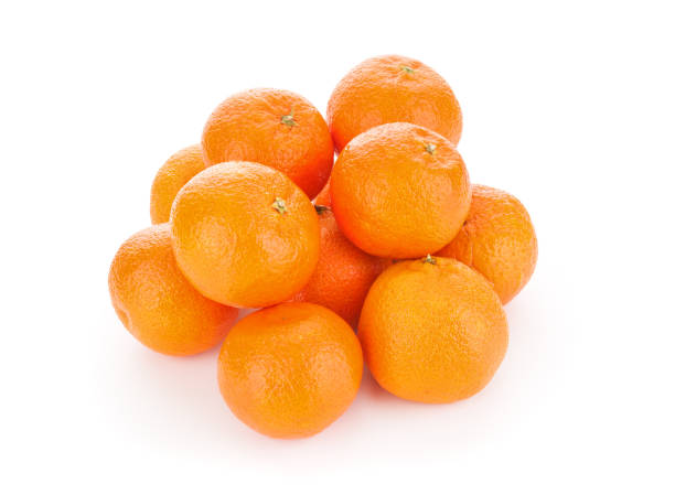 istock Pile of ripe tangerines on white background 1200977852