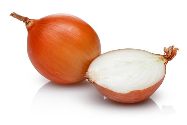 istock Half and whole onion isolated on white 1200978654