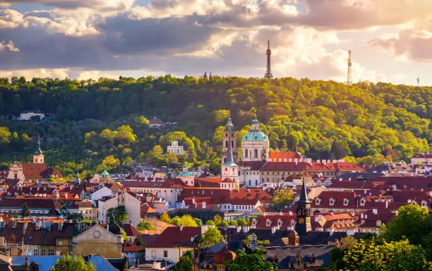 Photo of Spring view in Letna Park, Prague, Czech Republic. Spring in Prague (Praha), beautiful Letna park (Letenske sady) in sunlight, sunny landscape, popular tourist destination, Prague, Czech Republic