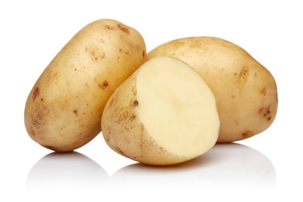 istock Fresh potatoes with slices isolated 1200979030