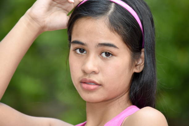 istock An An Unemotional Pretty Asian Youth 1200979389