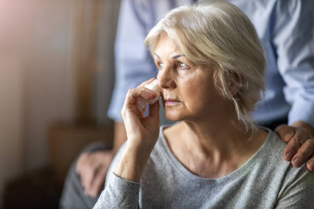 istock Unrecognizable senior man consoling his crying wife 1200979464