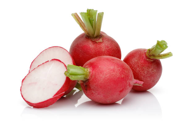 istock Red radish with slices isolated on white 1200980363