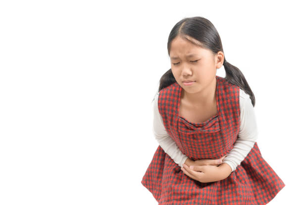 istock Asian child suffering from stomachache isolated 1200980993