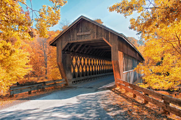 State Road Covered Bridge State Road Covered Bridge in Ashtabula, Ohio rural main street stock pictures, royalty-free photos & images
