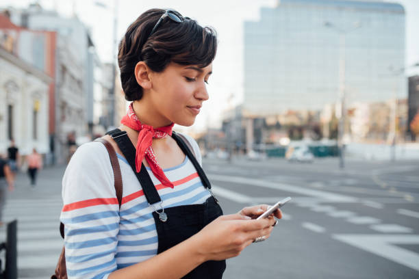 istock Young woman calling for taxi 1200982809