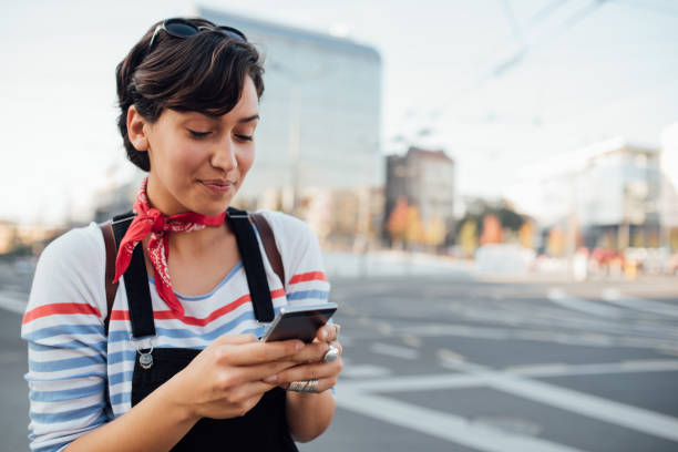 istock Young woman calling for taxi 1200982823