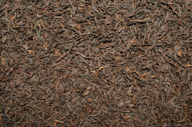 istock Background made of dried tea leaves 1200983586