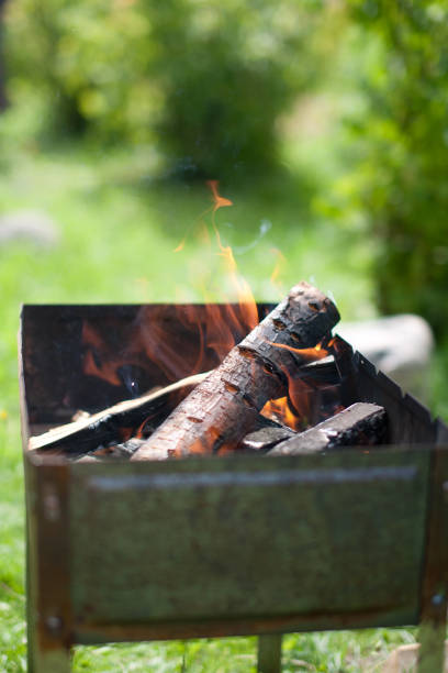 istock Brazier with fire and coal for cooking. Close-up. Horizontal. 1200988941