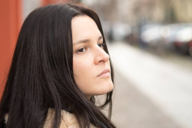 istock Beautiful woman, half profile portrait 1200989256