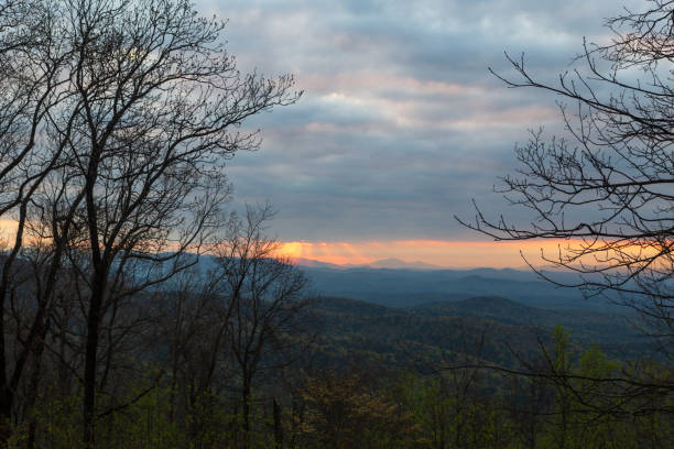 istock Sunrise through thick clouds over the Blue Ridge Mountains in Georgia. 1200990291