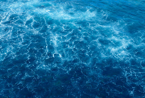 istock Abstract blue ocean water background.Sea waves natural texture. 1200992063