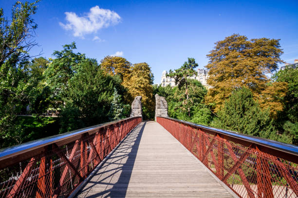 istock Hanging bridge in Buttes-Chaumont Park, Paris 1200995129