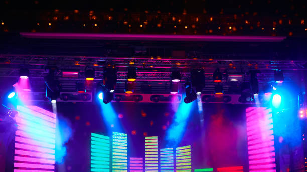 istock The Stage Spotlight with Laser rays. Event concept 1200996006