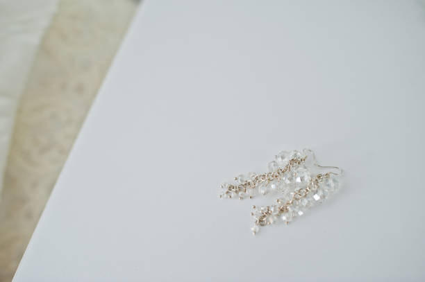 istock Wedding day. Accesories  for wedding preparation. Earrings. 1200996358