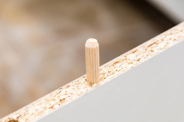 istock A little bit Inserted wooden peg in furniture. 1200996665