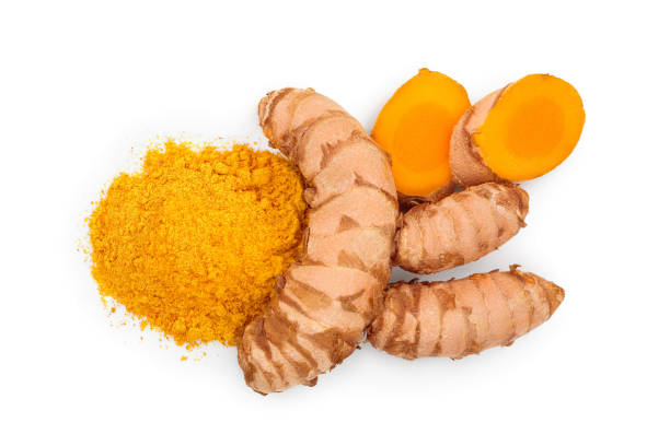 istock Turmeric powder and turmeric root isolated on white background. Top view. Flat lay 1200997994