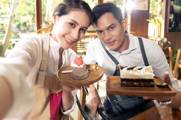 istock Cafe owner live their cafe. Selfie shot 1200999602
