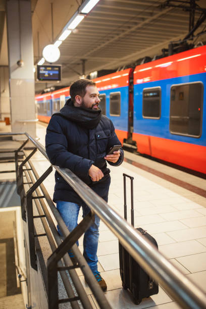 istock A solo traveler is waiting at the train station 1200999621