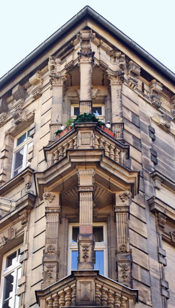 istock old sandstone building with corner balconies 1201000774