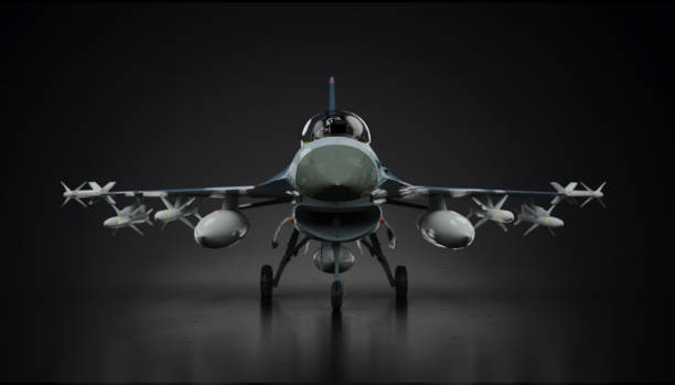 istock F-16 fighting falcon airplane fighter jet fully loaded  in dark background front view 3d render 1201001970