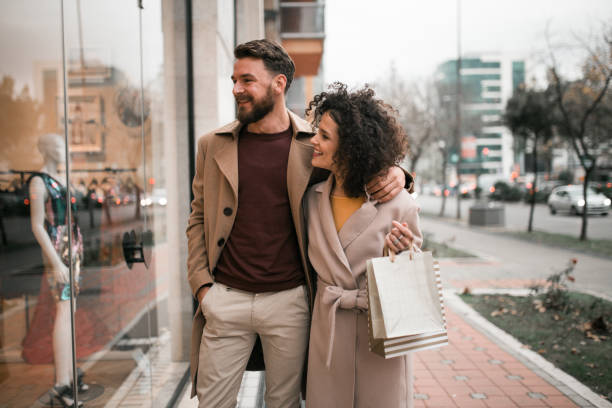 istock Young couple shopping for Valentine's day 1201002035