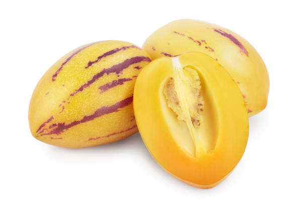 istock Fresh Pepino fruit with half isolated on white background. 1201002278