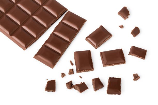 istock Cracked chocolate bar isolated on white background with clipping path. . Top view. Flat lay. 1201002343