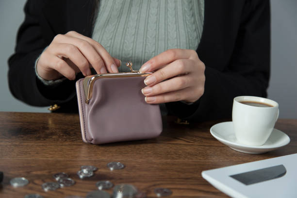 istock woman  hand purple wallet 1201002367