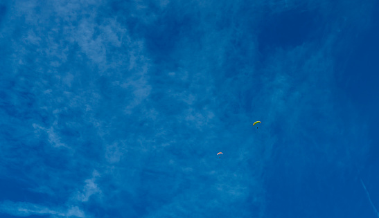 Paragliders over Lake Geneva, Switzerland.
