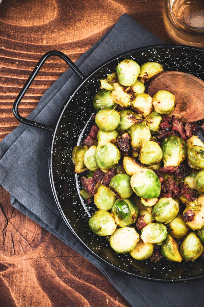istock Roasted Brussels Sprouts with Bacon. Christmas Traditional Dish 1201003408