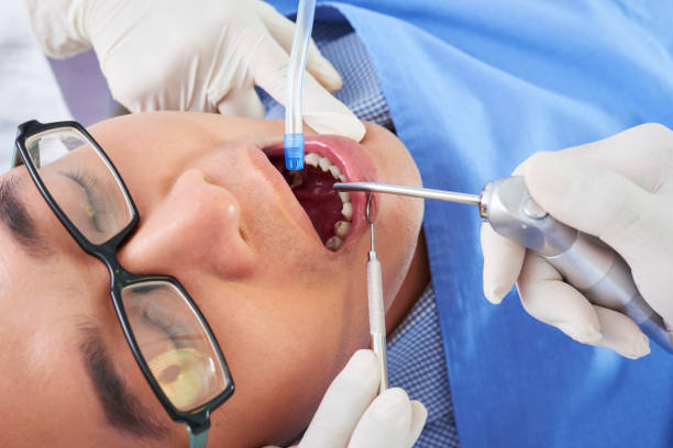 istock Asian Man On Dentist Chair 1201003588