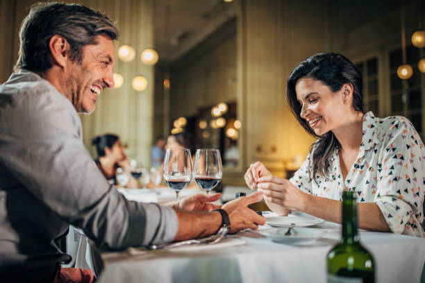 istock Mature man proposing a woman 1201003962