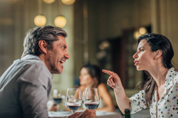 istock Mature couple arguing in restaurant 1201004345