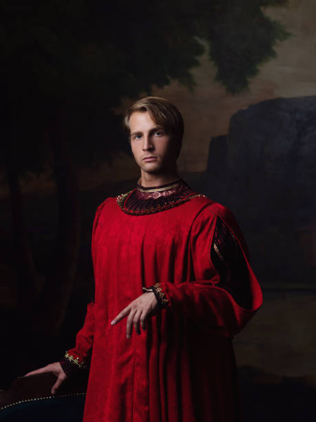 istock handsome man in a Royal red doublet 1201007554
