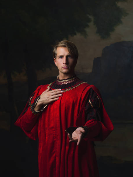 istock handsome man in a Royal red doublet 1201007563