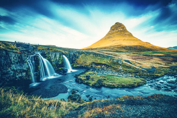 istock Kirkjufellsfoss waterfall with Kirkjufell mountain, Iceland 1201008952
