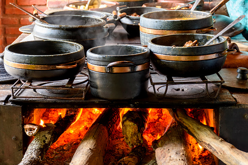 Traditional wood stove preparing typical Brazilian food in the kitchen of a farm