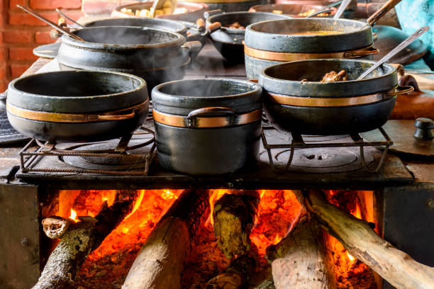 traditional wood stove preparing typical and traditional food - traditional foods imagens e fotografias de stock