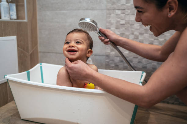 istock Mother and Baby Bathtime 1201010165
