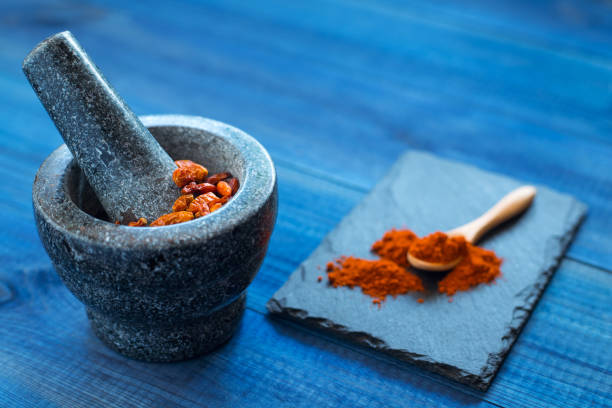 istock chilli peperoncini peppers in stone granite mortar 1201015036