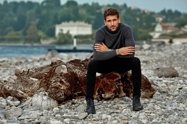 Fashionable male model posing outdoor in autumn outfit