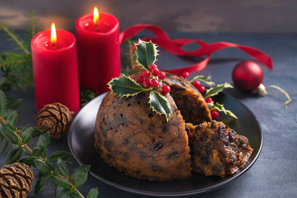 istock Christmas pudding decorated with sprig of holly. Cristmas decorations 1201019503