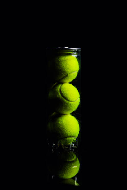 istock Tennis Ball isolated on black with dramatic lighting 1201019999