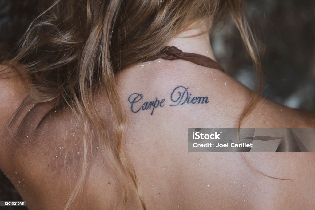 Carpe Diem Tattoo On Young Womans Back Stock Photo - Download Image Now - Tattoo, Close-up, Women - iStock Carpe Diem Tattoo On Young Womans Back Stock Photo - Download Image Now - Tattoo, Close-up, Women - iStock