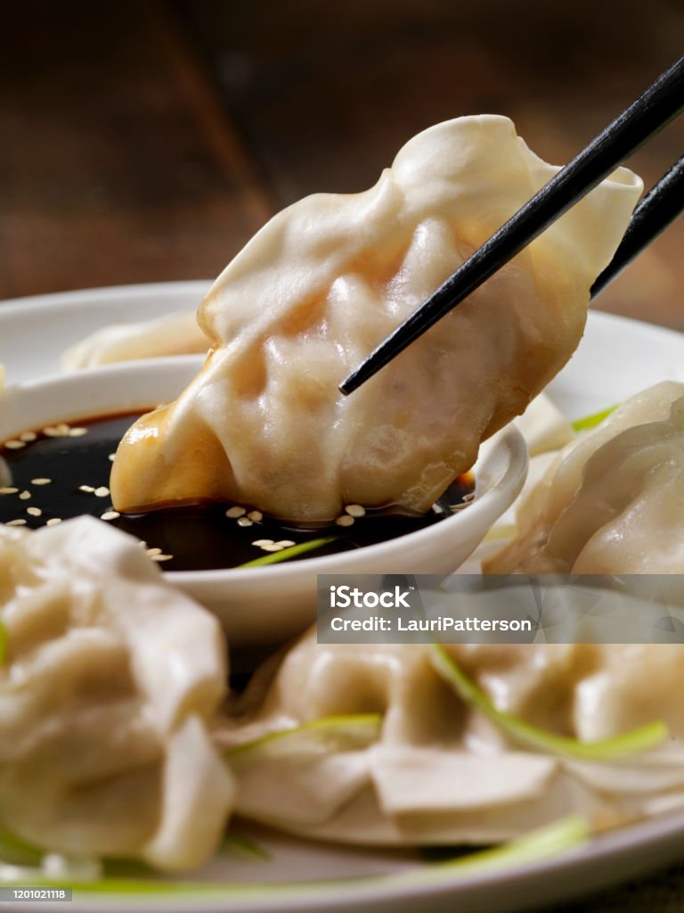 Steamed Asian Pork Dumplings with Soy Sauce and Green Onions Dumpling Stock Photo