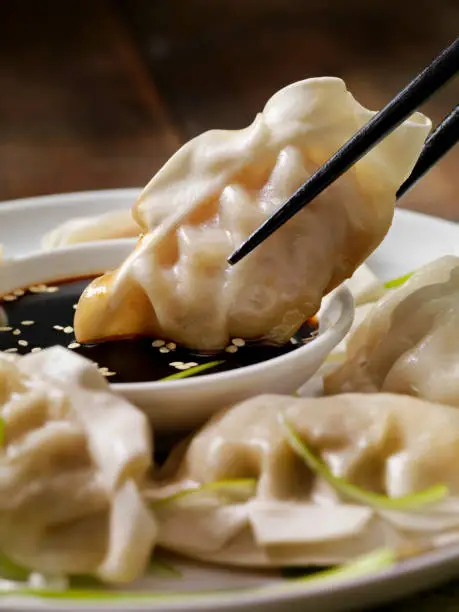 Steamed Asian Pork Dumplings with Soy Sauce and Green Onions