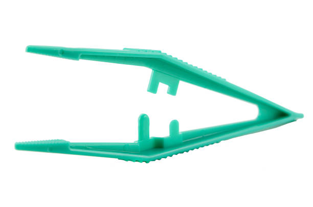 istock green plastic tweezers isolated on white 1201024526