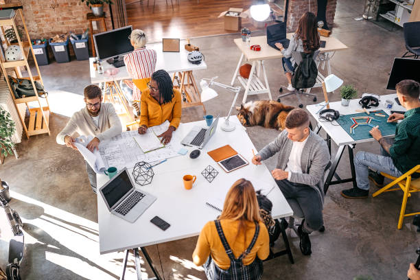 Business colleagues analyzing new project at office